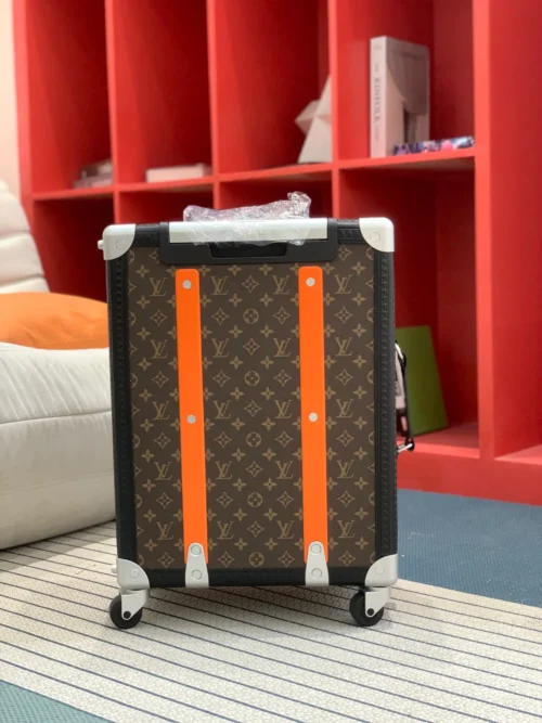 LOUIS VUITTON Rolling Trunk is made of Monogram canvas and leather - Image 10